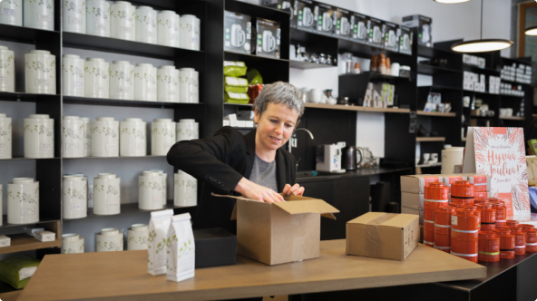 Woman packaging a box